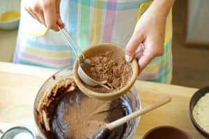Chocolate Buttercream Frosting Recipe adding cocoa powder