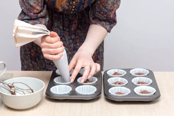 Use Piping Tips to pour batter into Cupcake pans