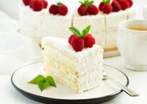 Amazing White Cake With Raspberry Filling And Whipped Cream Frosting