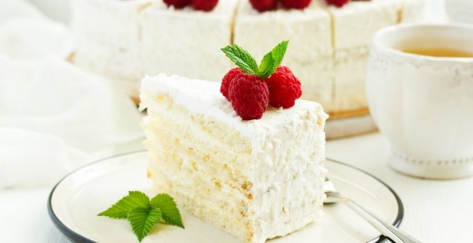 Amazing White Cake With Raspberry Filling And Whipped Cream Frosting