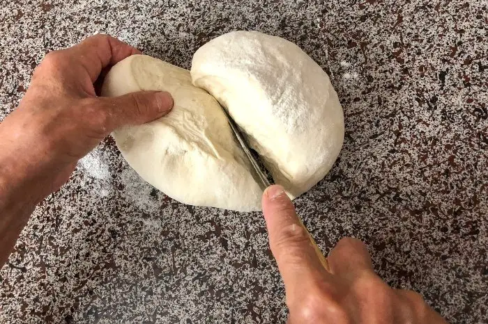Making The Savory Hand Pies - Cut dough in two
