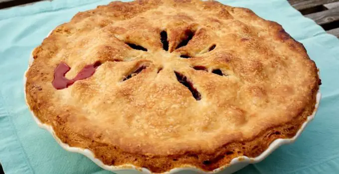 A Fruit Pie With A Thick Crust On Top