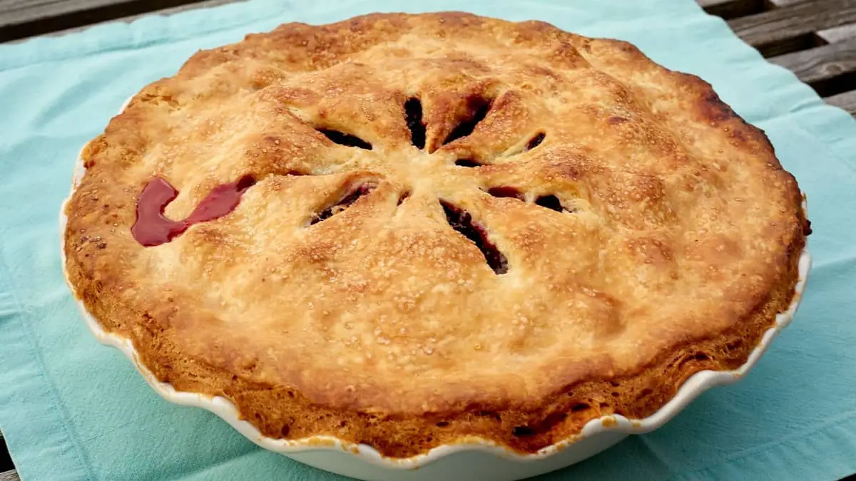 A Fruit Pie With A Thick Crust On Top